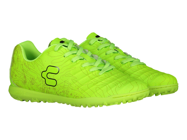 Zapato de fútbol Charly color limón con suela para césped sintético.