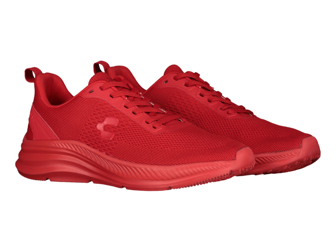 Tenis deportivos Charly de color rojo con suela gruesa y tejido transpirable.