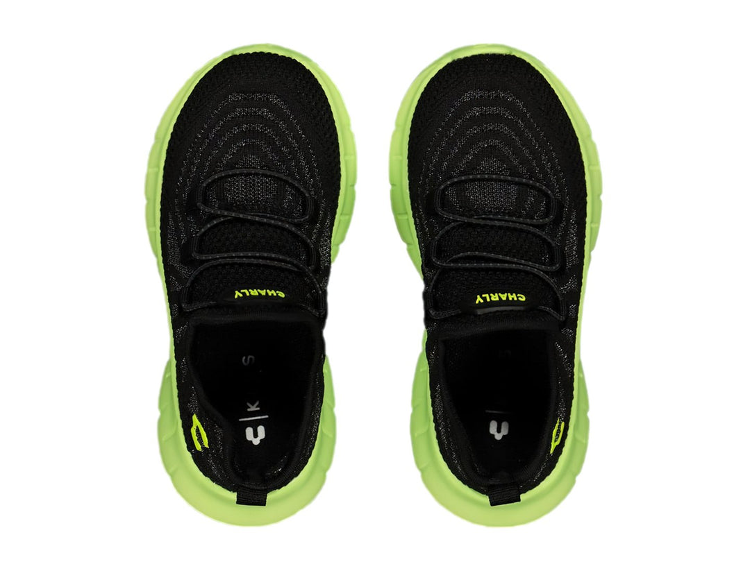Tenis deportivos Charly color negro con suela gruesa verde lima.