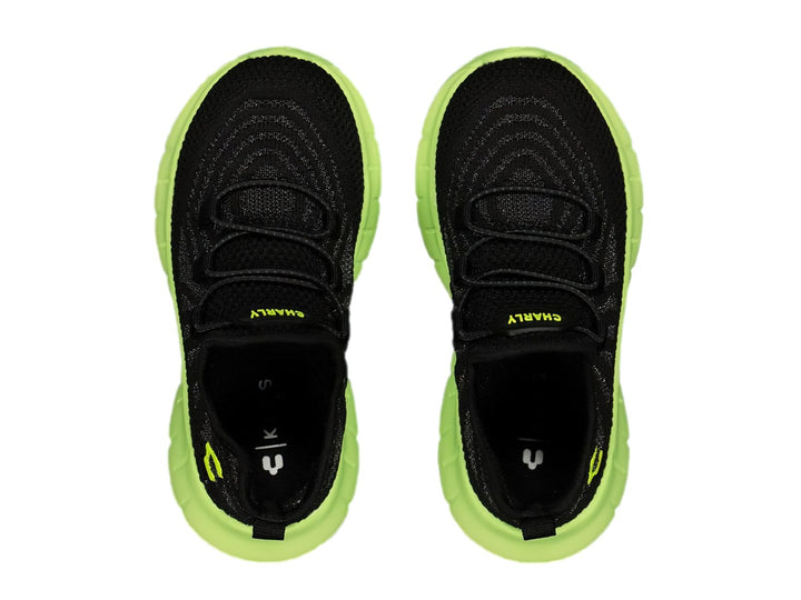 Tenis deportivos Charly color negro con suela gruesa verde lima.