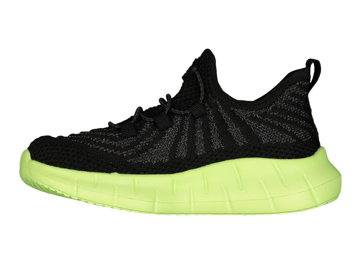 Tenis deportivos Charly color negro con suela gruesa verde lima.