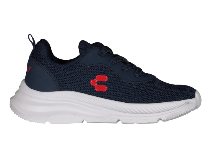Tenis deportivos Charly en color azul marino con suela blanca y detalle rojo lateral.