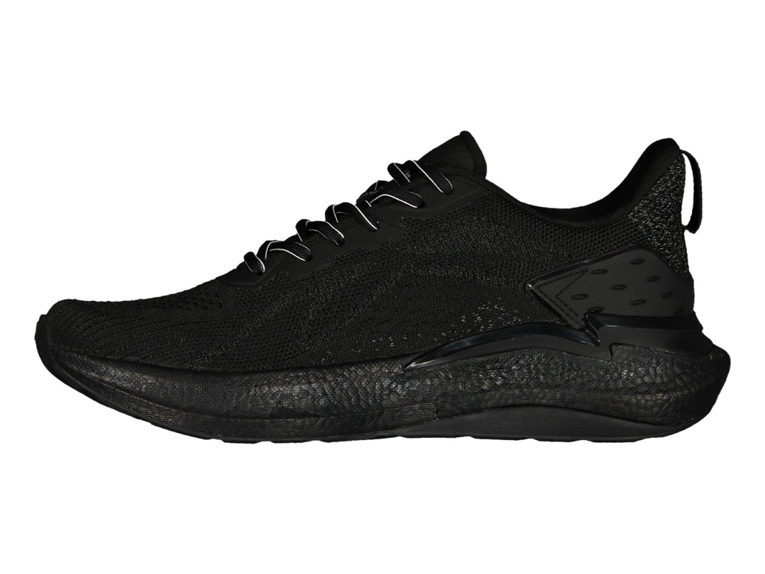 Tenis deportivo Charly color negro con tejido transpirable y suela gruesa.