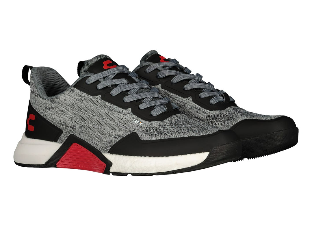 Tenis deportivos Charly color gris y negro con detalles en rojo y suela blanca.