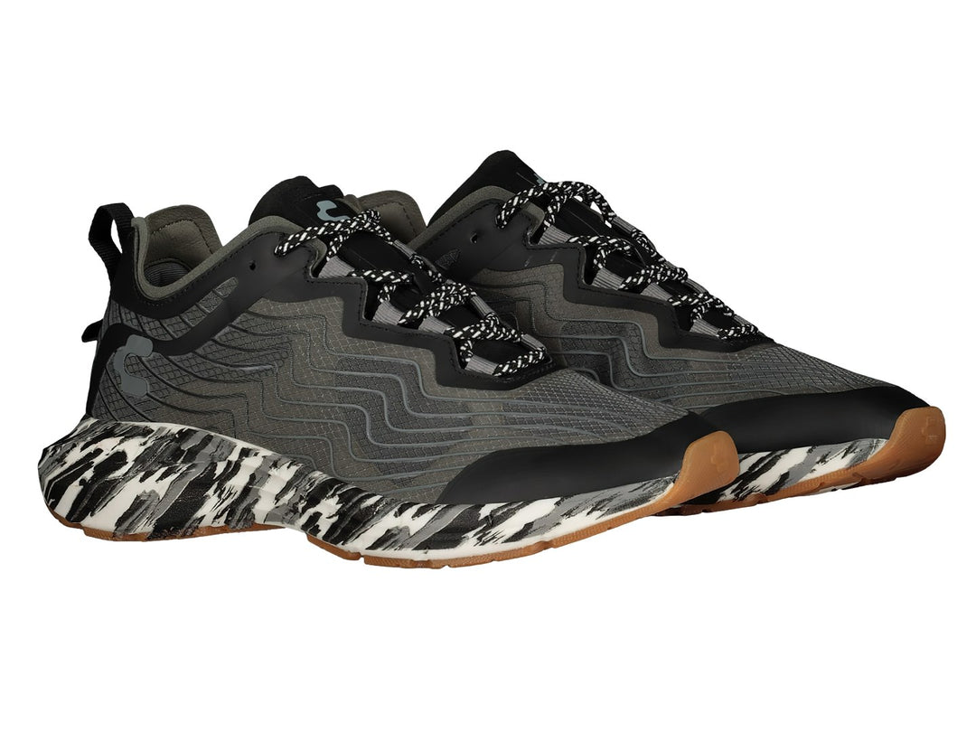 Tenis deportivos Charly color gris oscuro con suela moteada en blanco y negro y base color miel.