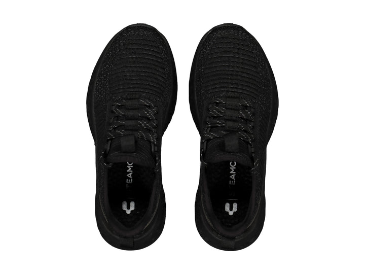 Tenis deportivos Charly color negro con tejido transpirable y suela robusta.
