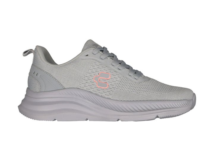 Tenis deportivos Charly color gris con tejido de malla y suela gruesa.