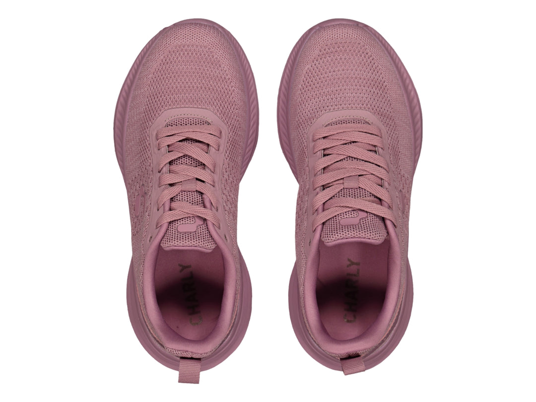 Tenis deportivos Charly color rosa con tejido de malla y suela gruesa.