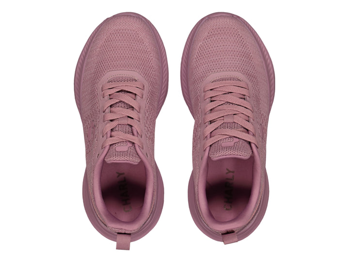 Tenis deportivos Charly color rosa con tejido de malla y suela gruesa.