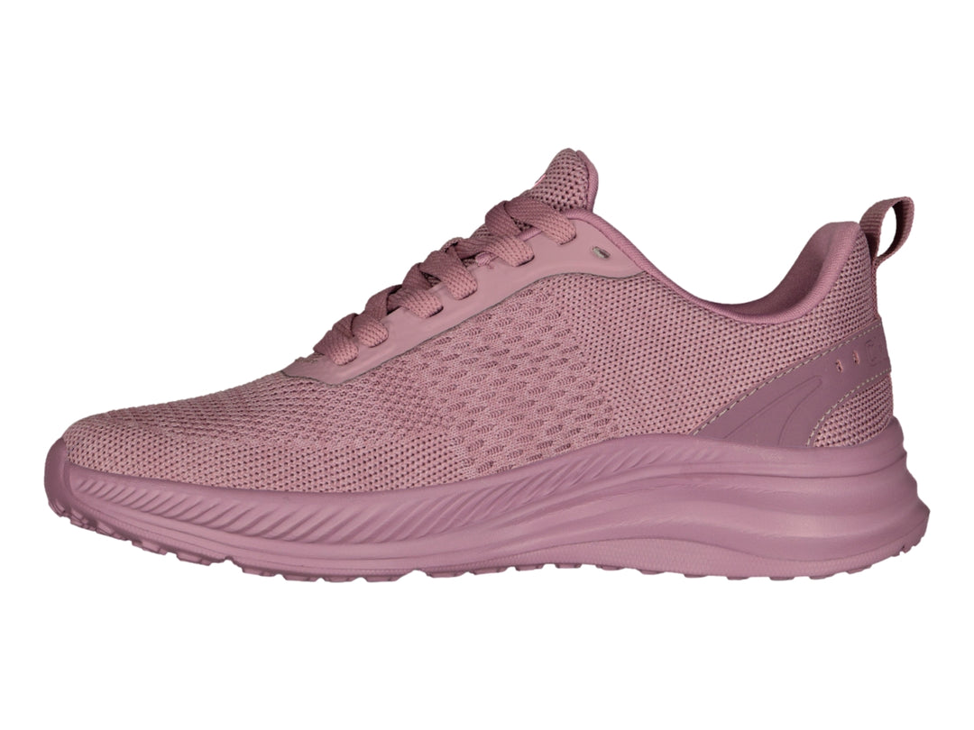 Tenis deportivos Charly color rosa con tejido de malla y suela gruesa.