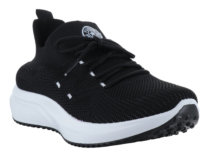 Tenis deportivos FUROR en color negro con suela blanca y agujetas negras.