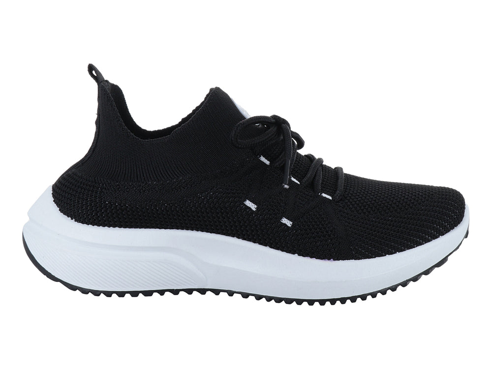 Tenis deportivos FUROR en color negro con suela blanca y agujetas negras.