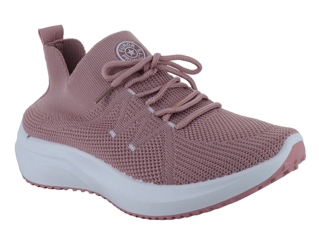 Tenis deportivos color rosa con suela blanca y tejido transpirable.