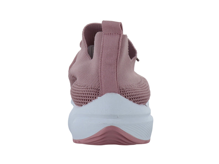 Tenis deportivos color rosa con suela blanca y tejido transpirable.
