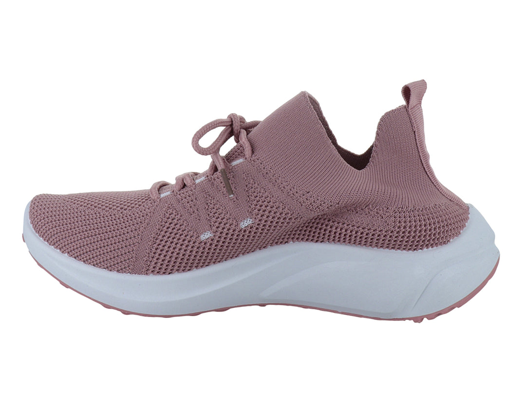 Tenis deportivos color rosa con suela blanca y tejido transpirable.