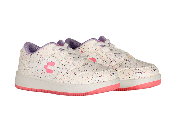 Tenis blancos con motas de colores, suela rosa y detalles morados de la marca Charly.