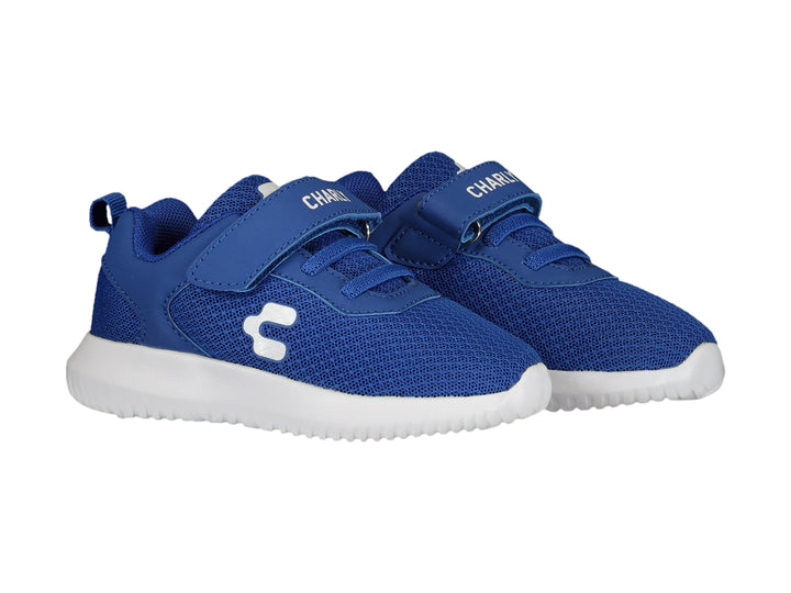 Tenis deportivos Charly color azul con suela blanca y cierre de velcro.