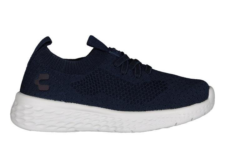 Tenis deportivos Charly color marino con suela blanca gruesa y tejido transpirable.