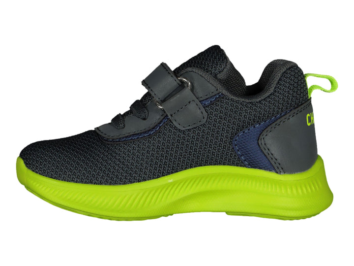 Tenis deportivos infantiles color gris con suela verde lima y cierre de velcro.