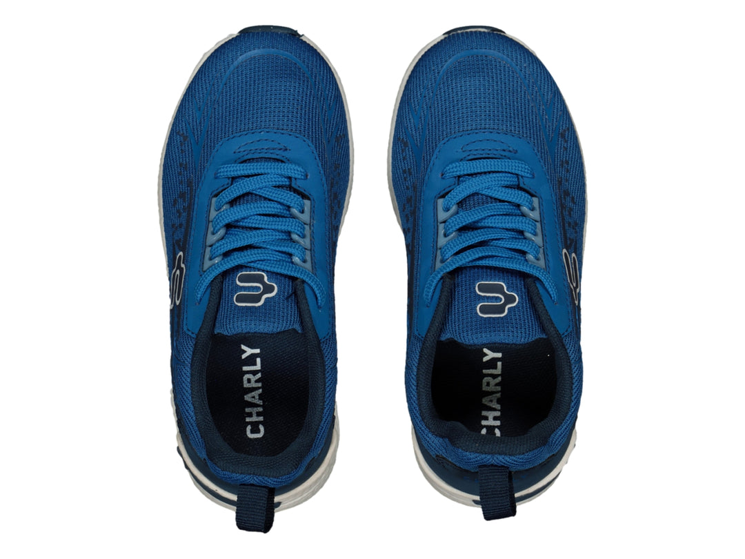 Tenis deportivos Charly en color azul con suela blanca y logotipo blanco lateral.