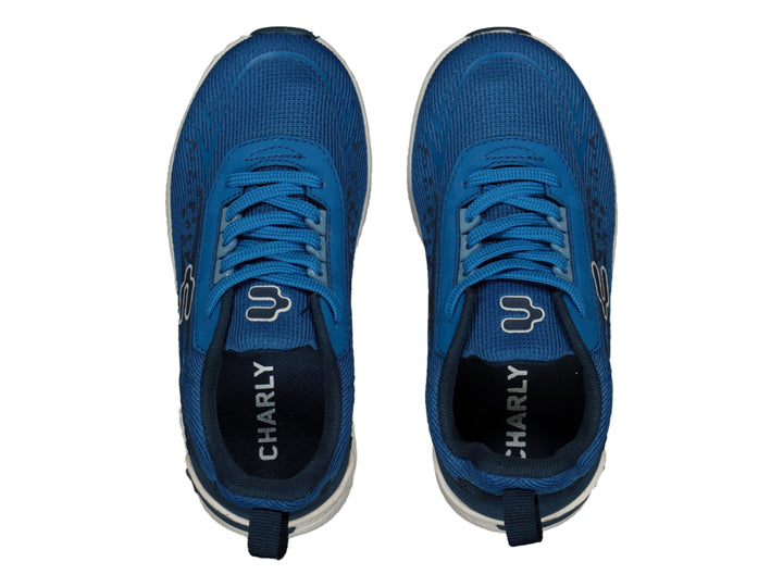 Tenis deportivos Charly en color azul con suela blanca y logotipo blanco lateral.