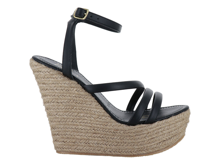 Sandalia de plataforma cuña color negro con base de yute trenzado y correa al tobillo.