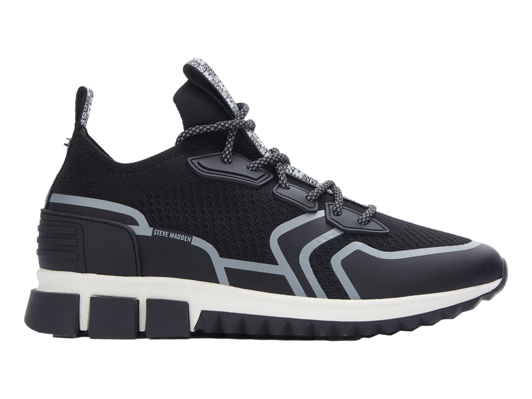Tenis deportivos Steve Madden Decon en color negro con detalles en gris y suela blanca y negra.