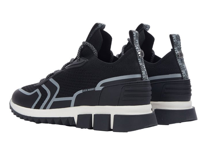 Tenis deportivos Steve Madden Decon en color negro con detalles en gris y suela blanca y negra.
