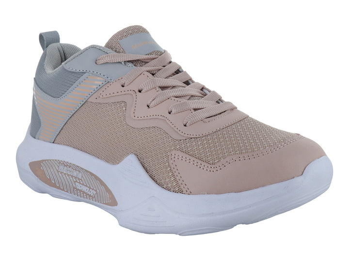 Tenis deportivos para niña en color maquillaje con detalles en gris y suela blanca.