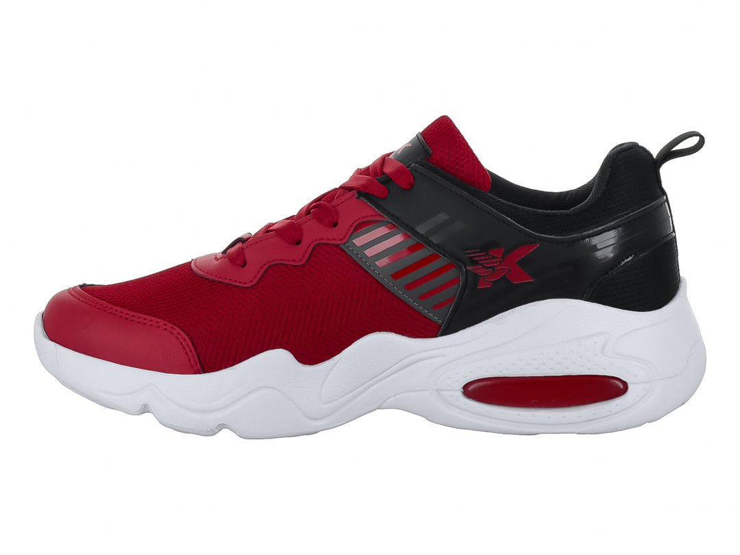 Tenis deportivos infantiles color rojo con detalles en negro y suela blanca.