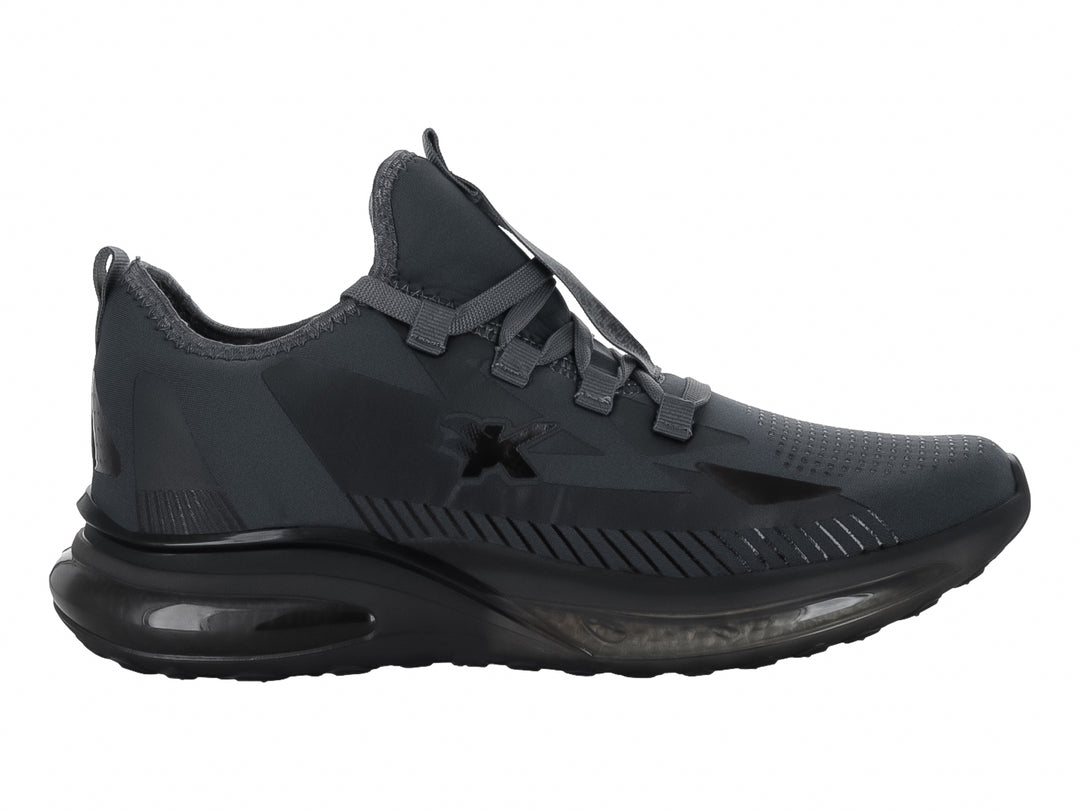 Tenis de baloncesto Makena color gris oscuro con suela negra y tejido transpirable.