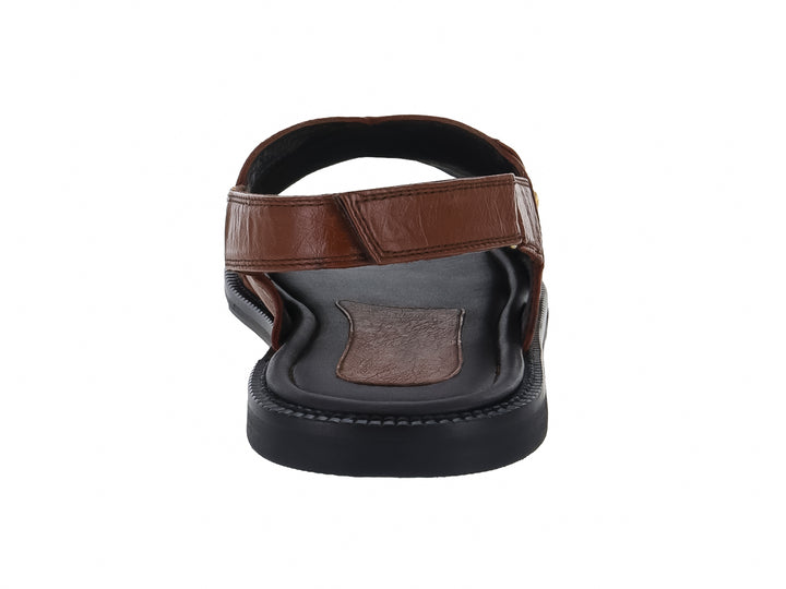 Sandalia para Hombre marca Marquez de Leon en color tabaco con textura de cuero de avestruz y suela negra.