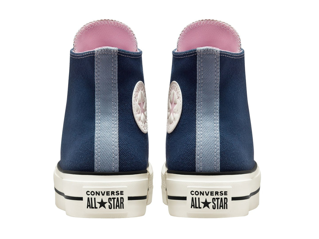 Tenis Converse Chuck Taylor All Star Lift Hi en color azul marino con suela de plataforma blanca.