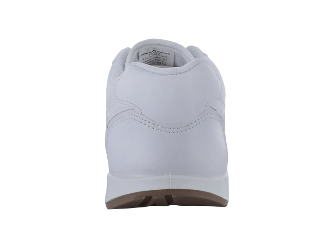 Tenis escolares blancos de la marca Panam con suela color café.