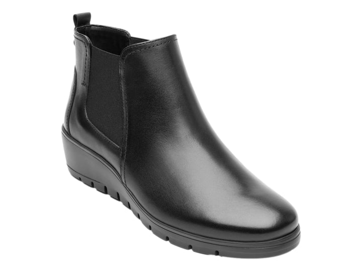 Botín Flexi para mujer en color negro, material de cuero liso con panel elástico lateral y suela cómoda.