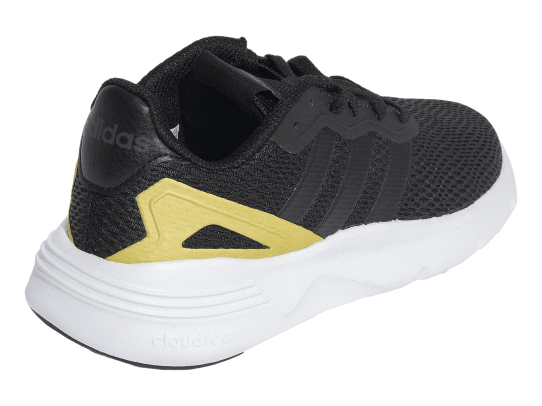 Tenis deportivos Adidas color negro con detalles dorados y suela blanca.