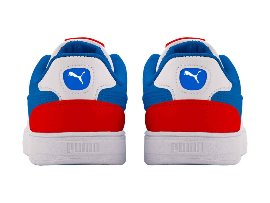 Tenis PUMA Caven Dime PS para niños en colores blanco, azul y rojo con suela blanca.