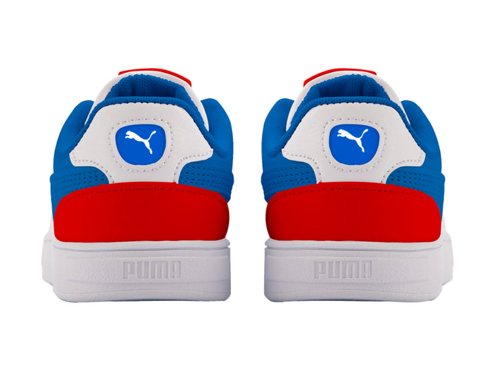 Tenis PUMA Caven Dime PS para niños en colores blanco, azul y rojo con suela blanca.