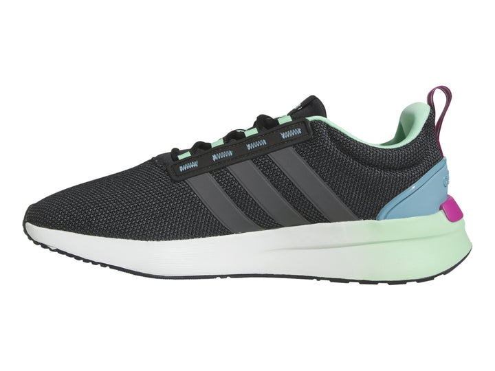 Tenis deportivos Adidas negros con franjas grises, suela blanca y acentos en rosa y verde menta.