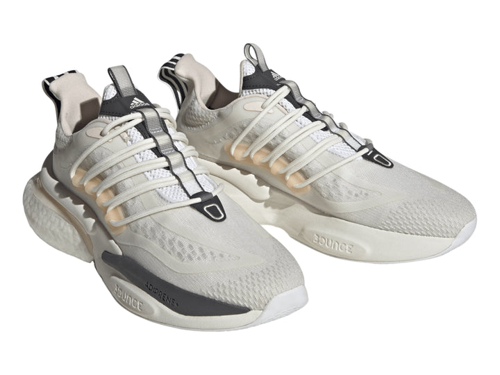Tenis Adidas Alphaboost V1 en color blanco con detalles en beige y gris, diseño deportivo moderno.