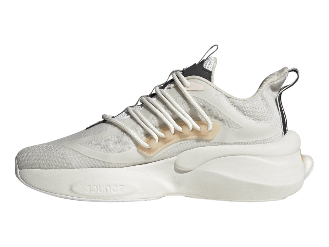Tenis Adidas Alphaboost V1 en color blanco con detalles en beige y gris, diseño deportivo moderno.