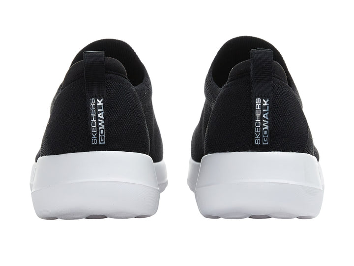 Tenis Skechers Go Walk Joy color negro con suela blanca, estilo slip-on de tela tejida.