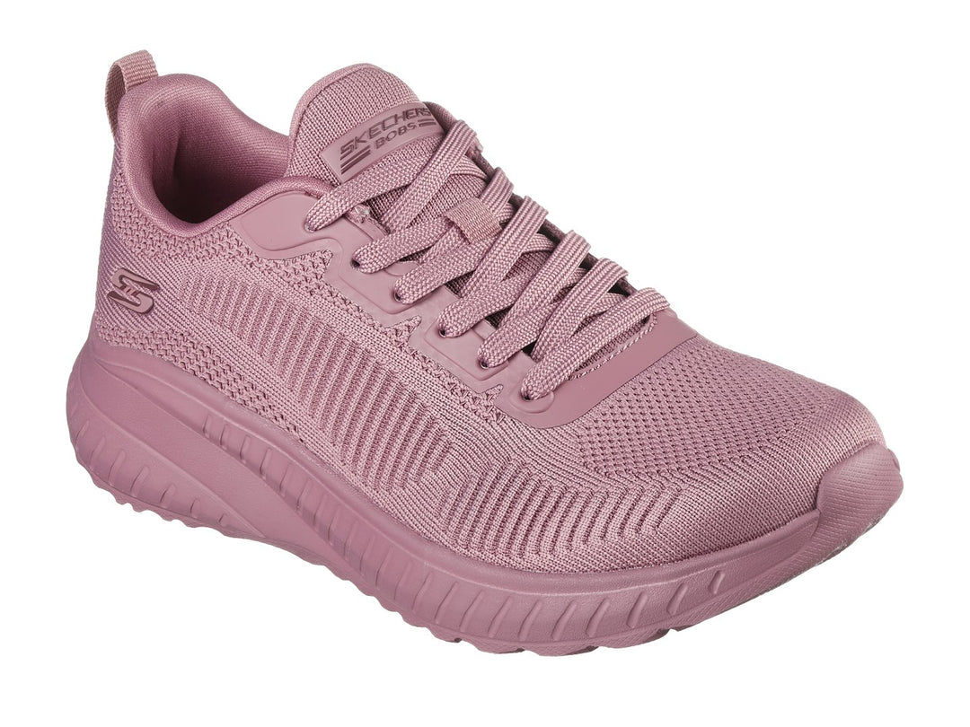 Tenis SKECHERS BOBS SQUAD CHAOS color rosa con acabado tejido y suela gruesa.