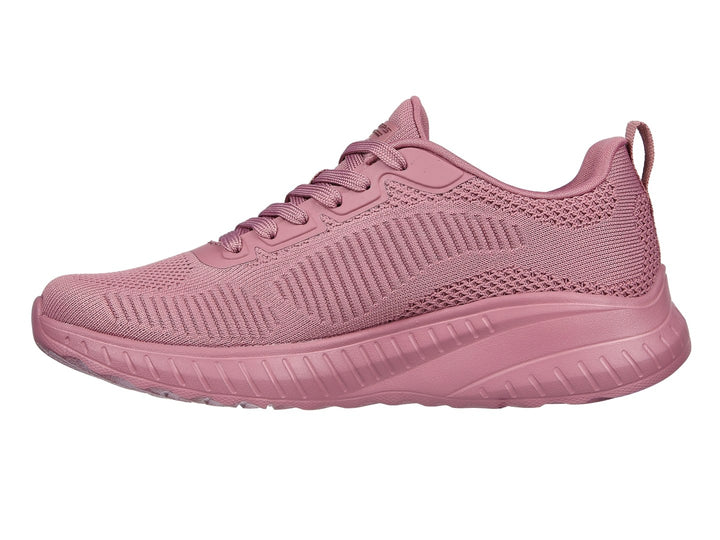 Tenis SKECHERS BOBS SQUAD CHAOS color rosa con acabado tejido y suela gruesa.
