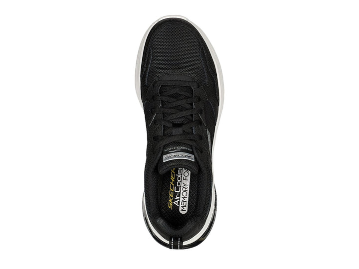 Tenis deportivos Skechers color negro con suela blanca y cámara de aire en el talón.