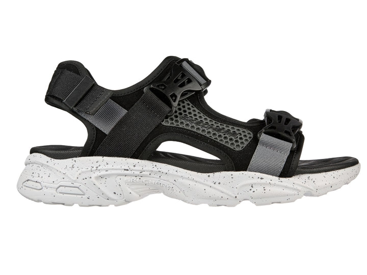 Sandalia deportiva Skechers en color negro y gris con suela blanca moteada y correas ajustables.