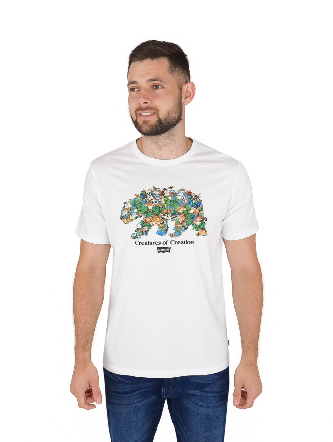 Camiseta blanca de manga corta con estampado gráfico de animales y el texto Creatures of Creation.
