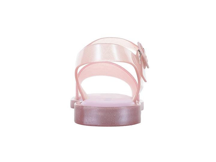 Sandalias infantiles Mini Melissa de color rosa brillante con correa ajustable y hebilla.
