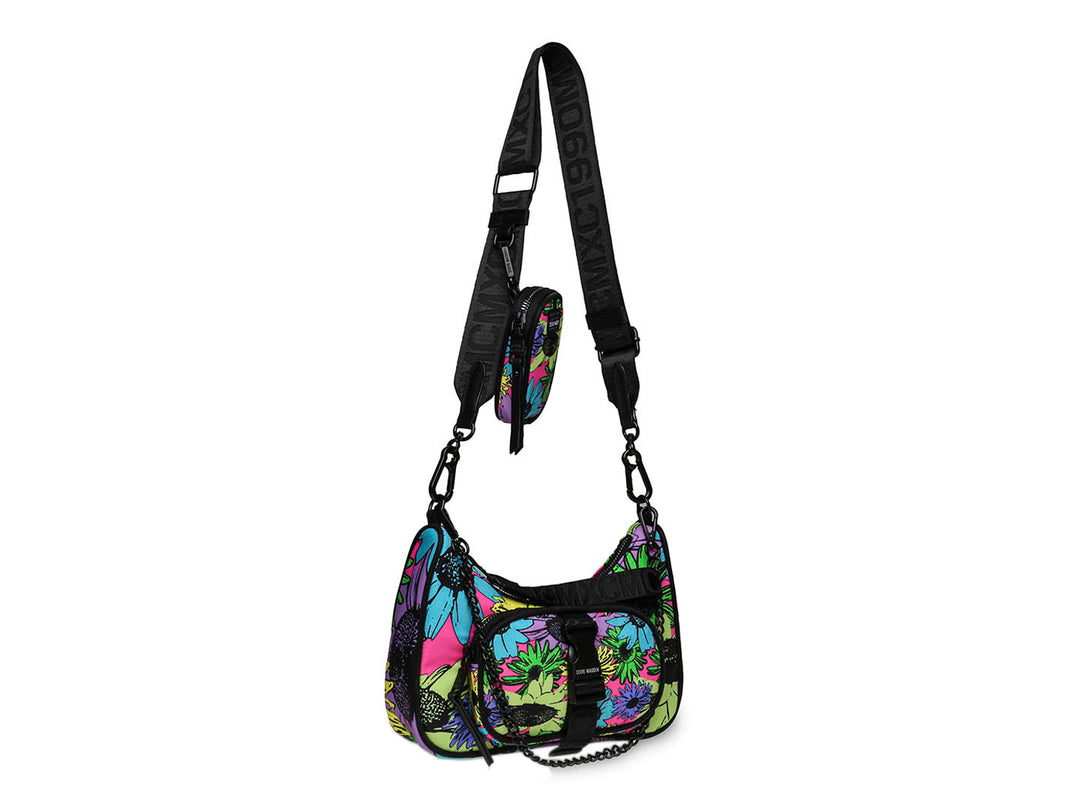 Bolso Steve Madden modelo Blouie con estampado floral multicolor, detalles de cadena negra y cierre superior.