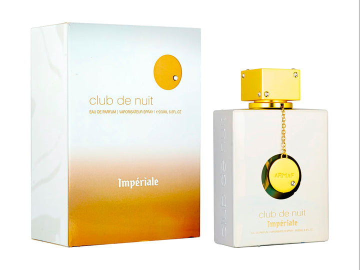 Perfume Armaf Club de Nuit Impériale para mujer en frasco blanco con detalles dorados y su caja correspondiente.